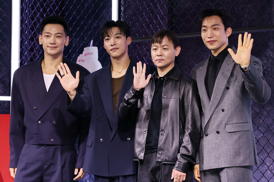 Main cast and director of Netflix's Bloodhounds Season 2 posing at the official production press conference in Seoul.